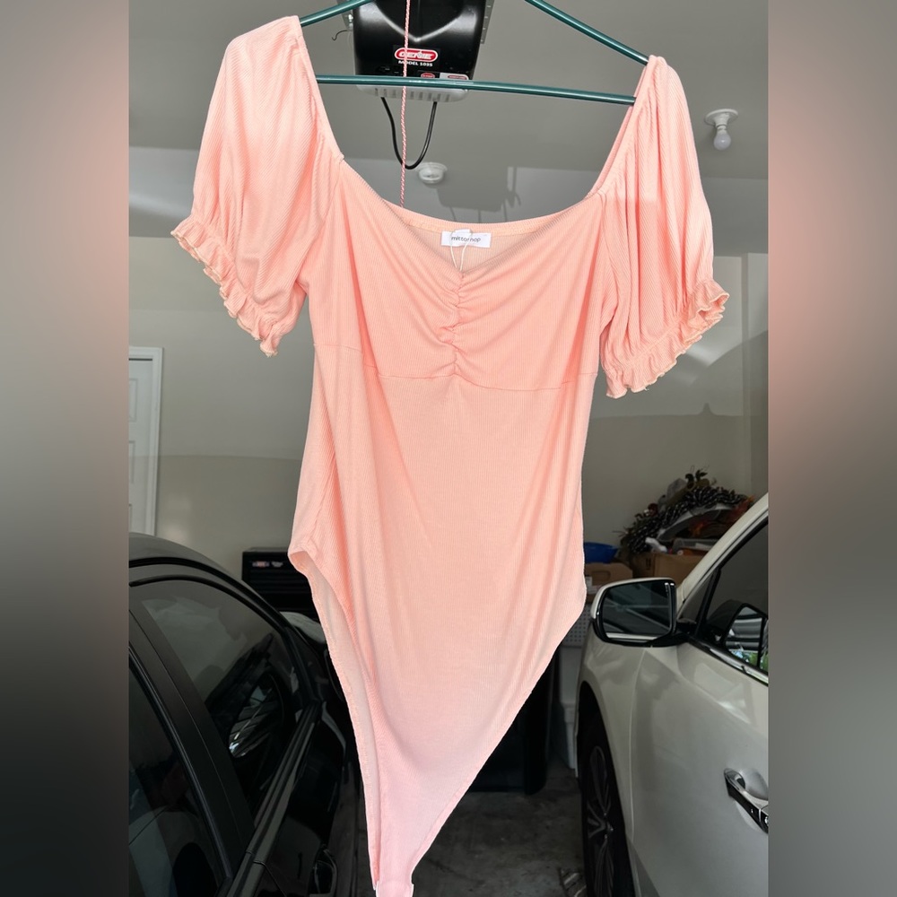 Never worn body suit